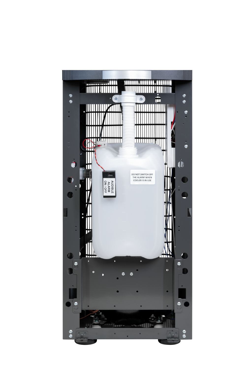 OVERFLOW10 drainage kit shown installed inside a dispenser cabinet; dispenser not included
