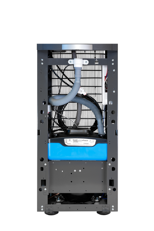 PUMP2L drainage kit shown installed inside a dispenser cabinet; dispenser not included
