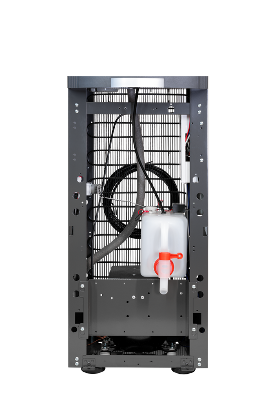 WB4465 drainage kit shown installed inside a dispenser cabinet; dispenser not included